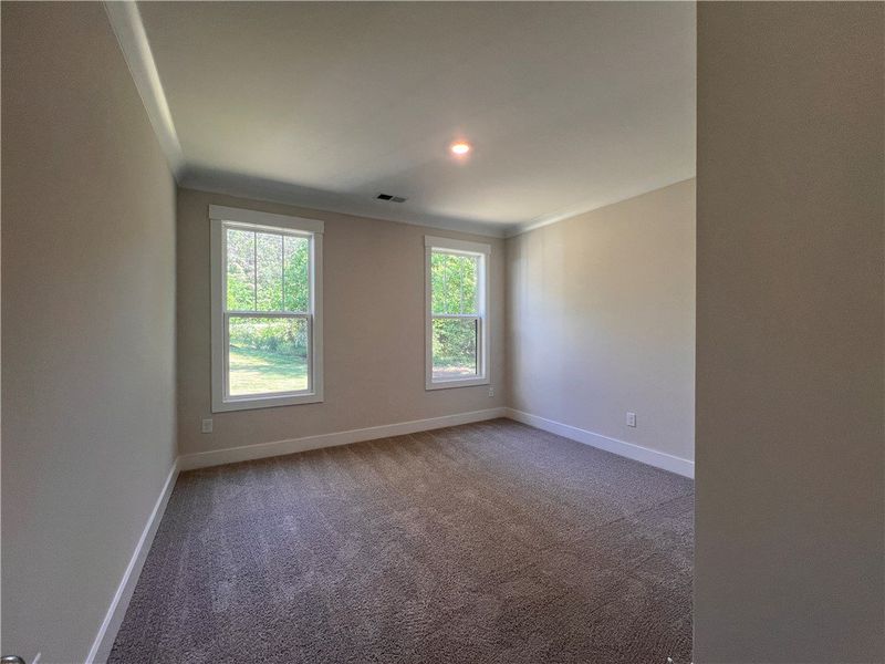 This inviting room offers natural light and a comf