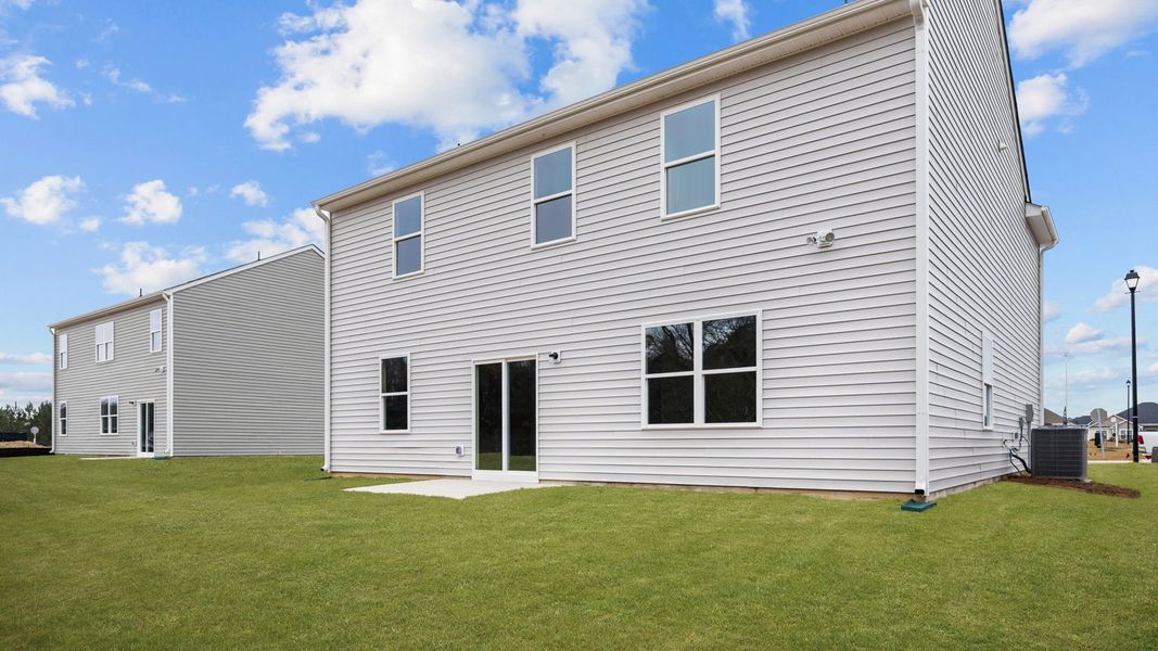 Exterior details and patio area of a home in Villa Grande, Winterville (Image 20).