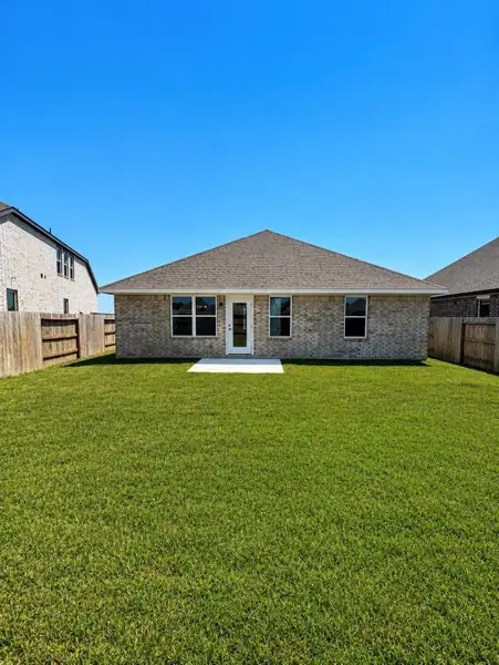 Exterior details and patio area of a home in River Ranch Trails, Dayton (Image 3).