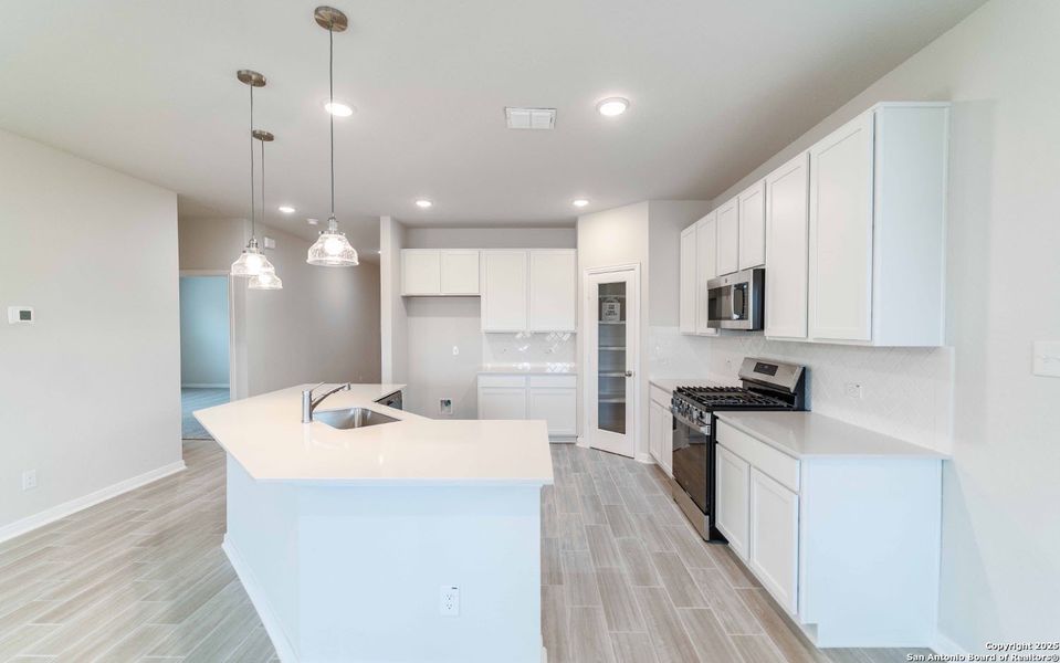 Furnished interior view inside a new home in Morgan Meadows, San Antonio (Image 5). Furnished interior view inside a new home in Morgan Meadows, San Antonio (Image 5).