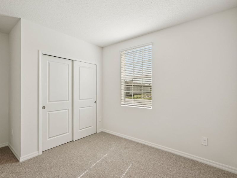 Spacious, unfurnished interior of a new home in Magnolia Bay - Classic Series, Nokomis (Image 8).