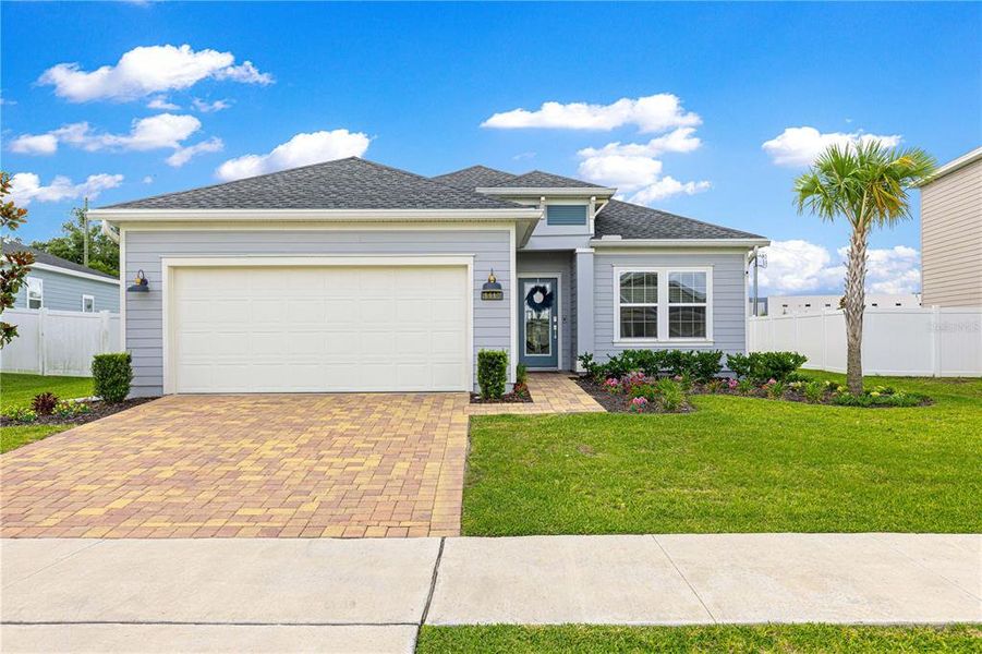 Front exterior of a new home in , Ocala, FL, highlighting curb appeal (Image 22).
