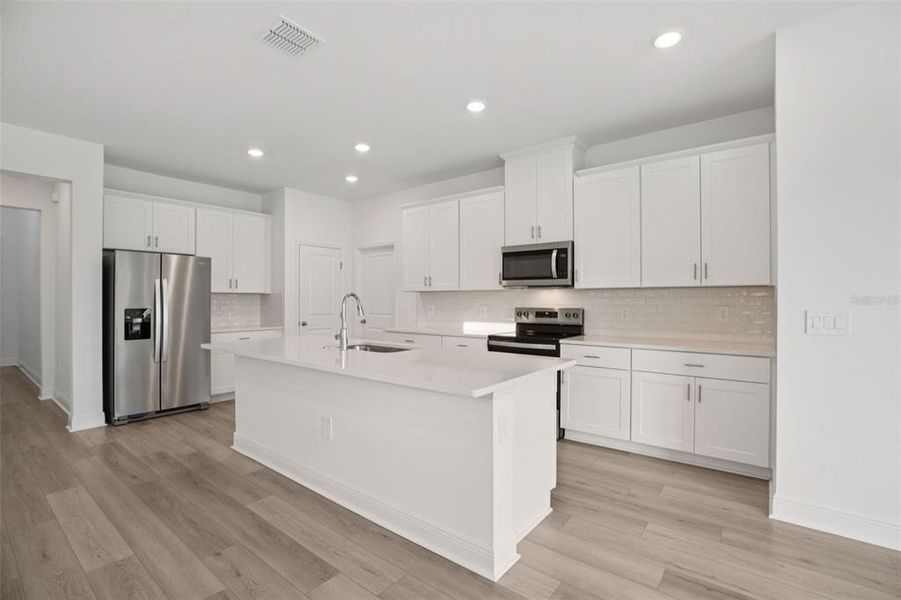 Furnished interior view inside a new home in Cyrene at Minneola - Villas, Minneola (Image 15).