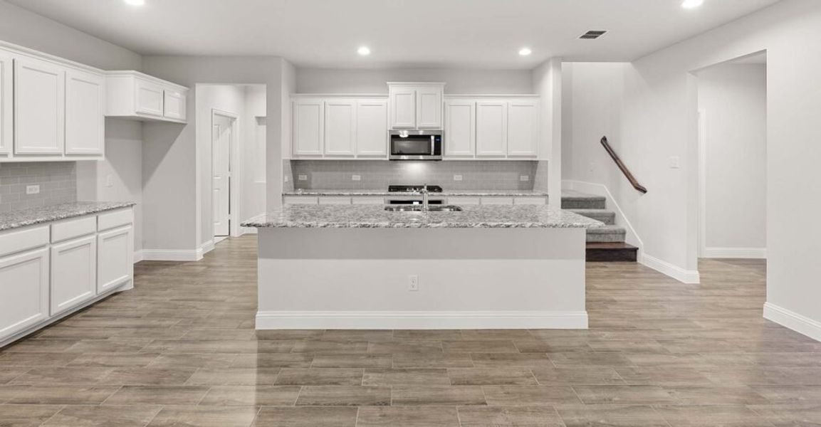 Representative exterior photo of a completed home built from the Thornbury by Impression Homes in Still Water Lake, Godley, TX (Image 6). Representative exterior photo of a completed home built from the Thornbury by Impression Homes in Still Water Lake, Godley, TX (Image 6).