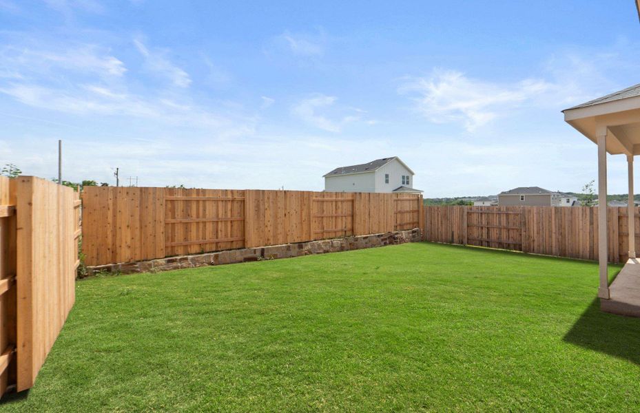 Exterior details and patio area of a home in Sunfield, Buda (Image 20).