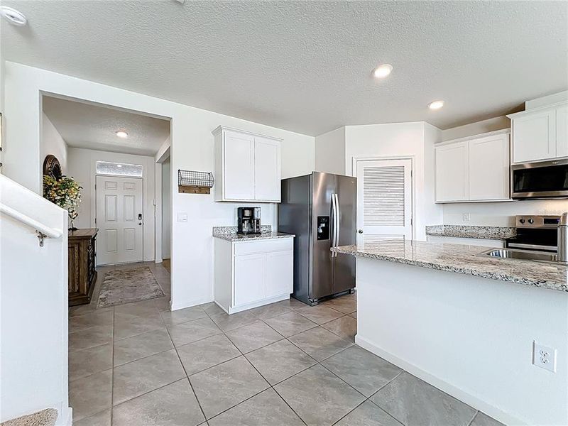 Furnished interior view inside a new home in Cypress Bay West, Palm Bay (Image 8).