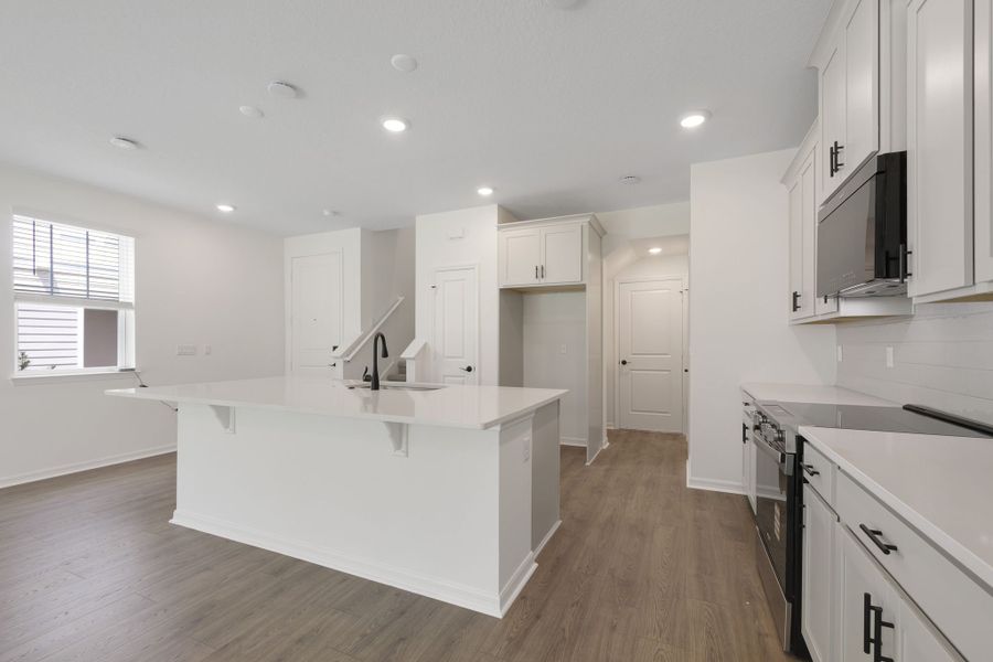 Furnished interior view inside a new home in Towns at Greenleaf, Oviedo (Image 11).