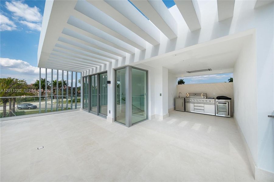 Exterior details and patio area of a home in , Weston (Image 26).