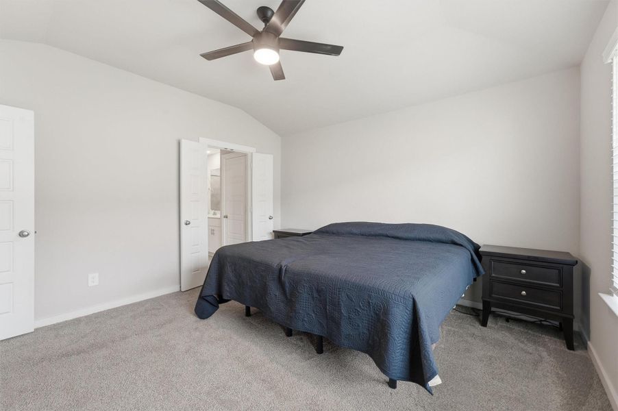 another angle of he Primary bedroom with soothing neutral tones and plush carpets another angle of he Primary bedroom with soothing neutral tones and plush carpets
