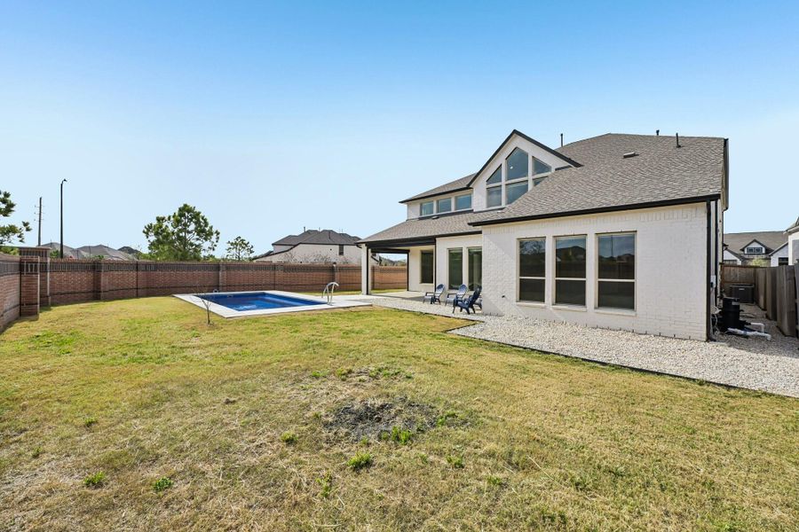 Exterior details and patio area of a home in Elyson, Katy (Image 27).