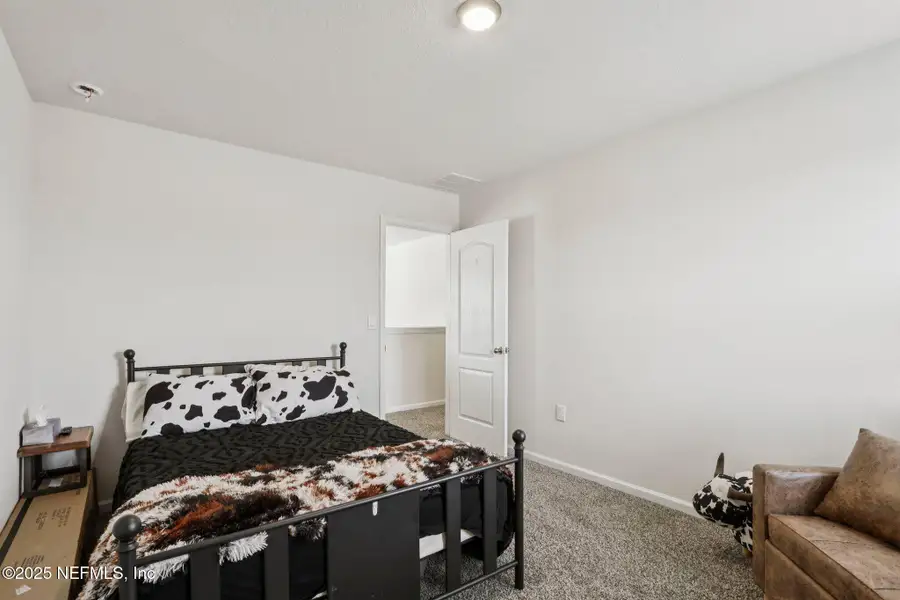 Furnished interior view inside a new home in Cross Creek Express, Green Cove Springs (Image 18).