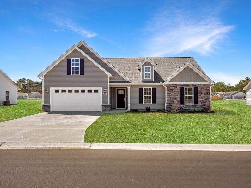 Representative exterior photo of a completed home built from the Pamlico A by JC Jackson Homes,LLC in Heritage Pointe, Newport, NC (Image 17).