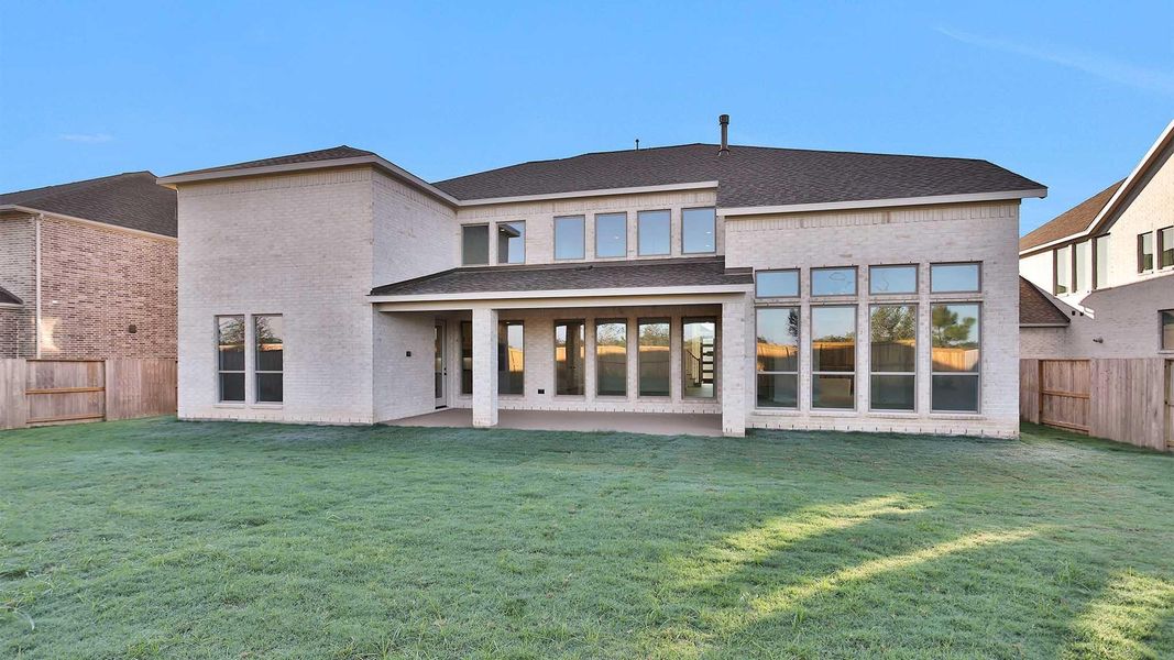 Exterior details and patio area of a home in Meridiana 80' - Gated, Manvel (Image 3). Exterior details and patio area of a home in Meridiana 80' - Gated, Manvel (Image 3).
