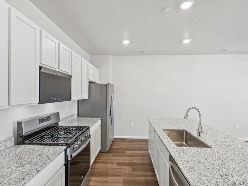 Furnished interior view inside a new home in Poudre Heights: The Meadow Collection, Windsor (Image 7).