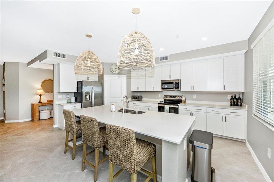 Furnished interior view inside a new home in Wellen Park Golf & Country Club, Venice (Image 34).