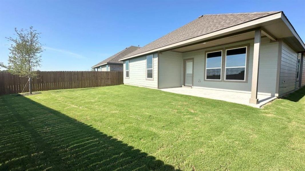 Front exterior of a new home in Rock Creek Ranch, Fort Worth, TX, highlighting curb appeal (Image 1). Front exterior of a new home in Rock Creek Ranch, Fort Worth, TX, highlighting curb appeal (Image 1).