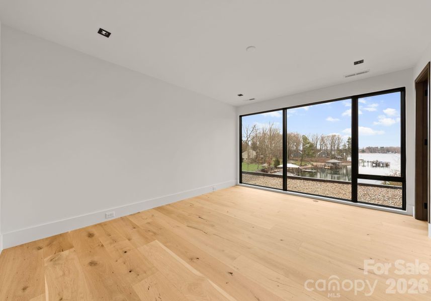 Guest suite with full bathroom and spacious walk-in closet. Guest suite with full bathroom and spacious walk-in closet.