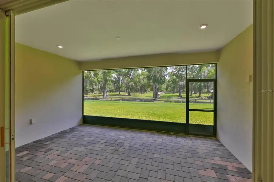 Exterior details and patio area of a home in , Parrish (Image 25).