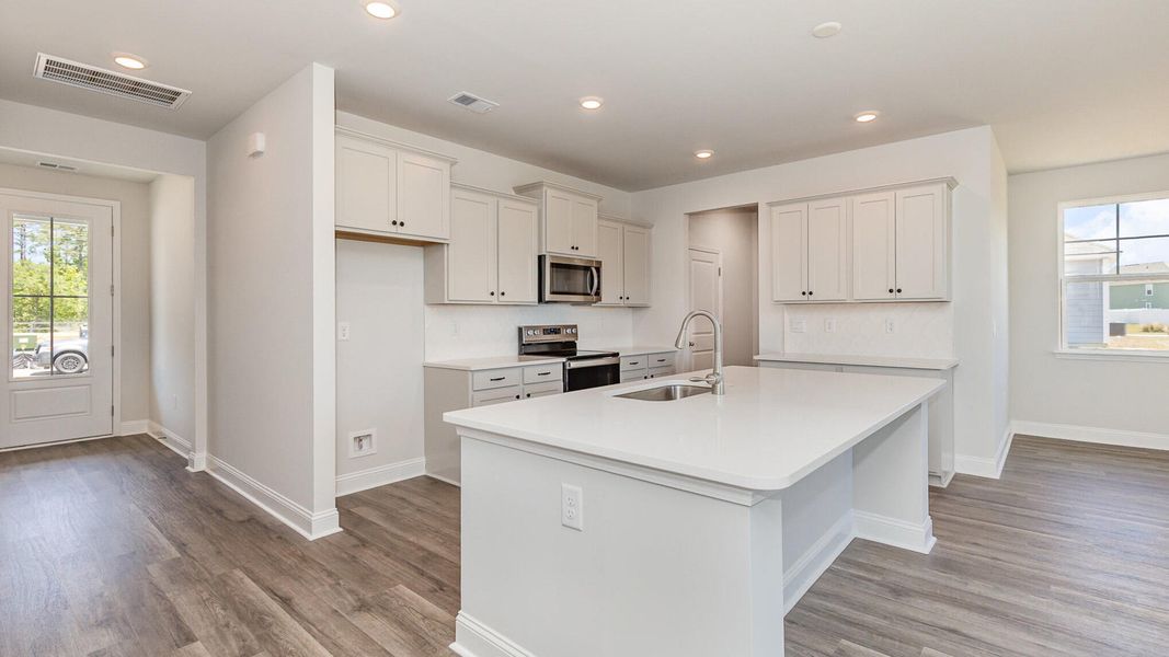 Furnished interior view inside a new home in The Cove at Mallard Crossing, Summerville (Image 3). Furnished interior view inside a new home in The Cove at Mallard Crossing, Summerville (Image 3).