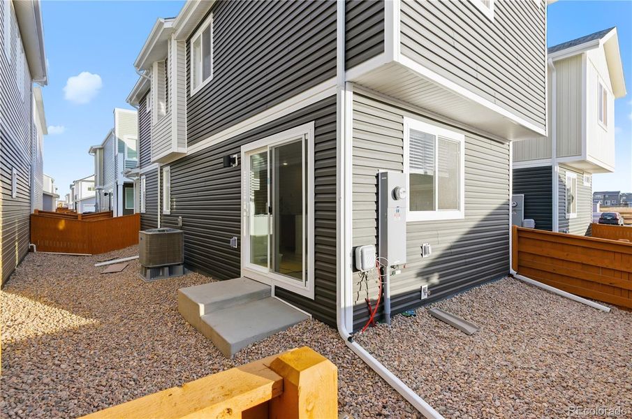 Exterior details and patio area of a home in Reunion, Commerce City (Image 16).