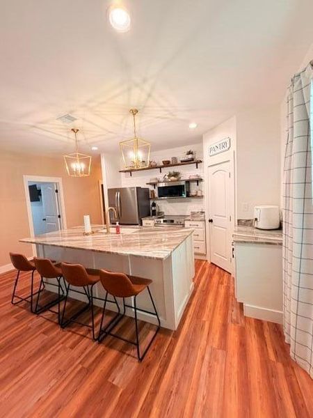 Furnished interior view inside a new home in , Manning (Image 9).