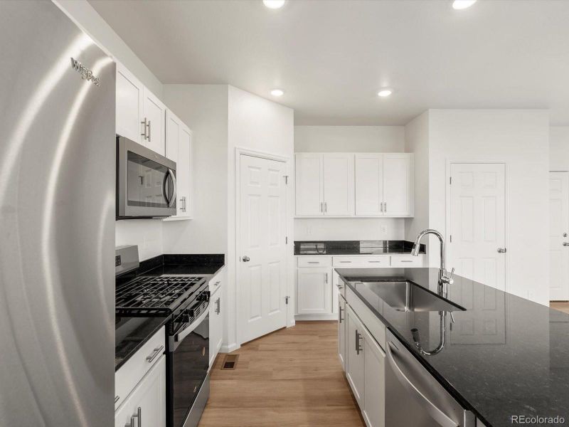 Furnished interior view inside a new home in Westgate, Greeley (Image 10).