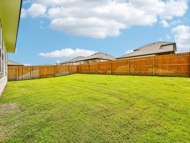 Exterior details and patio area of a home in Eastern Wells, Jarrell (Image 3).