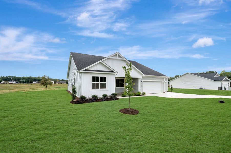 Front exterior of a new home in McAlister Creek, Clayton, NC, highlighting curb appeal (Image 2).