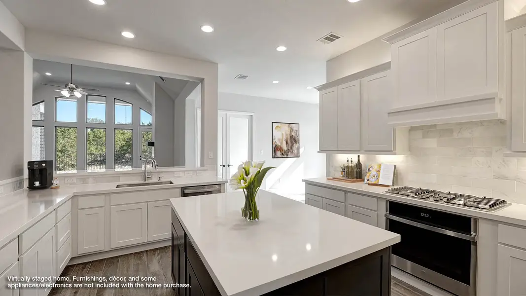 Furnished interior view inside a new home in The Woodlands Hills, Willis (Image 3). Furnished interior view inside a new home in The Woodlands Hills, Willis (Image 3).