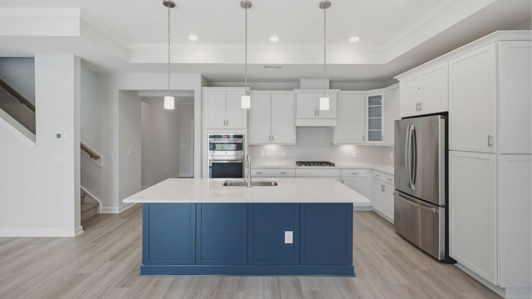 Furnished interior view inside a new home in The Courtyards at Oak Grove, Durham (Image 10).