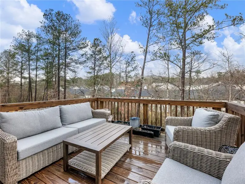 Exterior details and patio area of a home in Creekside at Farmers Crossing, Ball Ground (Image 2). Exterior details and patio area of a home in Creekside at Farmers Crossing, Ball Ground (Image 2).