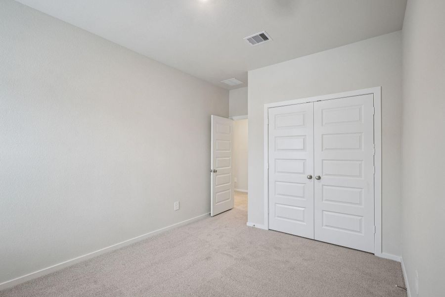 Spacious, unfurnished interior of a new home in Pinewood Trails - City Series, Atascocita (Image 32).