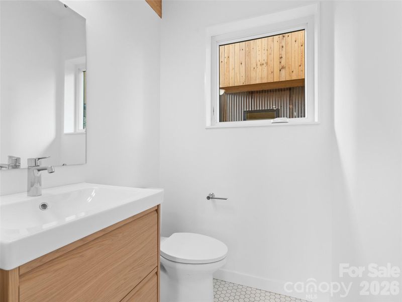 Main level half bathroom