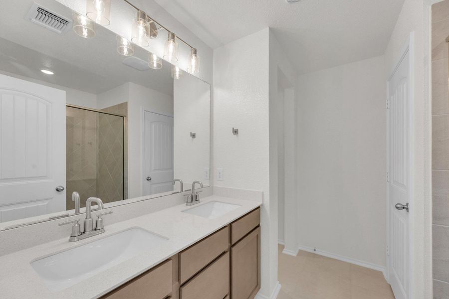 Furnished interior view inside a new home in Mustang Valley, Manor (Image 14).