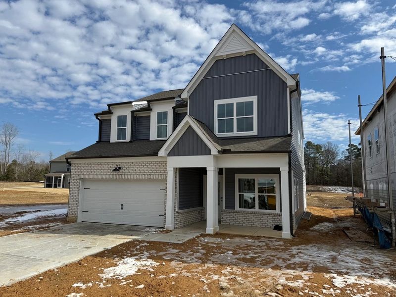 Exterior  - Earthy and warm tones feel rooted in place.