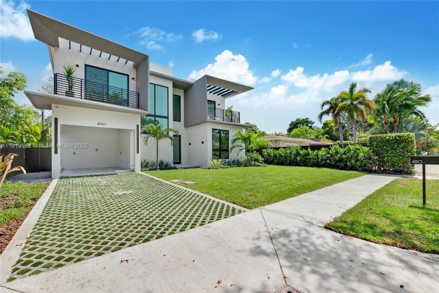 Front exterior of a new home in , Miami, FL, highlighting curb appeal (Image 1). Front exterior of a new home in , Miami, FL, highlighting curb appeal (Image 1).