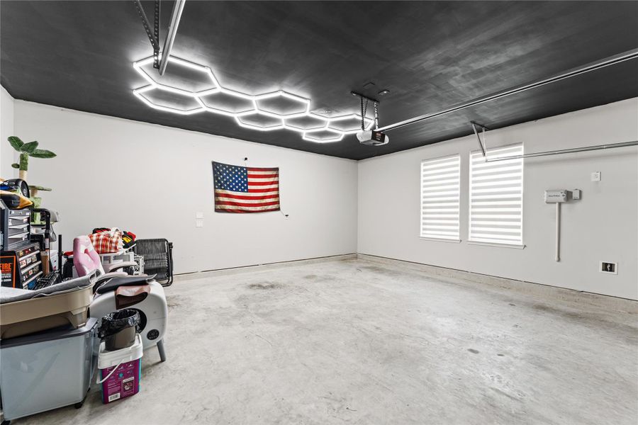 Garage holds a full sized Escalade/Suburban or YukonNotice cool lighting in garage