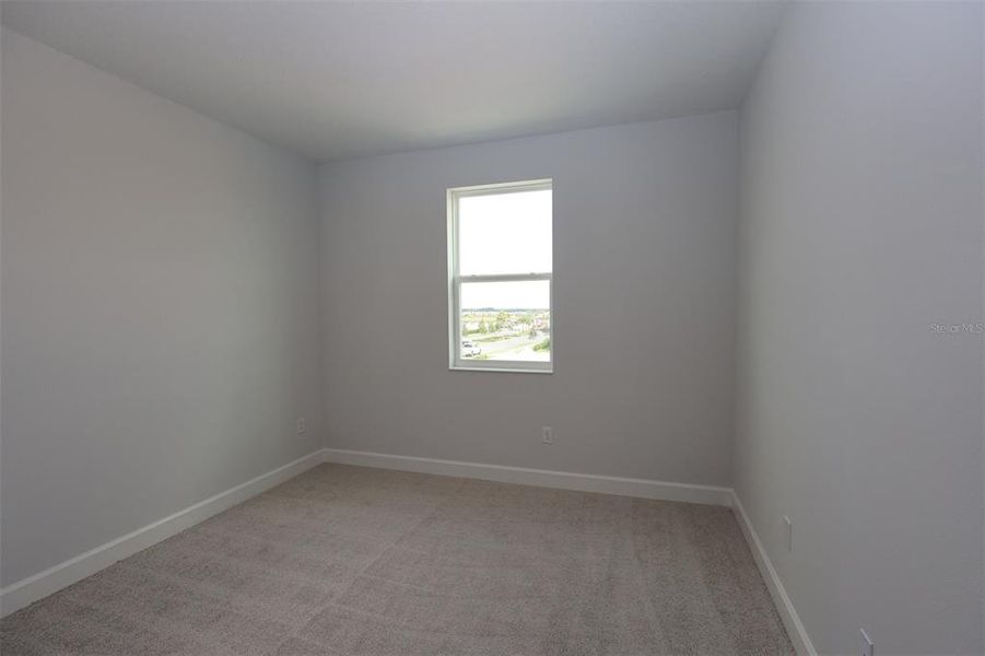 Spacious, unfurnished interior of a new home in Lake Star at Ovation, Winter Garden (Image 36).