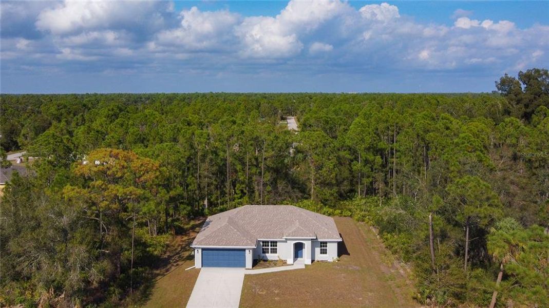 Front exterior of a new home in , Punta Gorda, FL, highlighting curb appeal (Image 22).