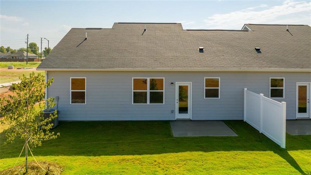 Exterior details and patio area of a home in Remington Chase, Perry (Image 3).