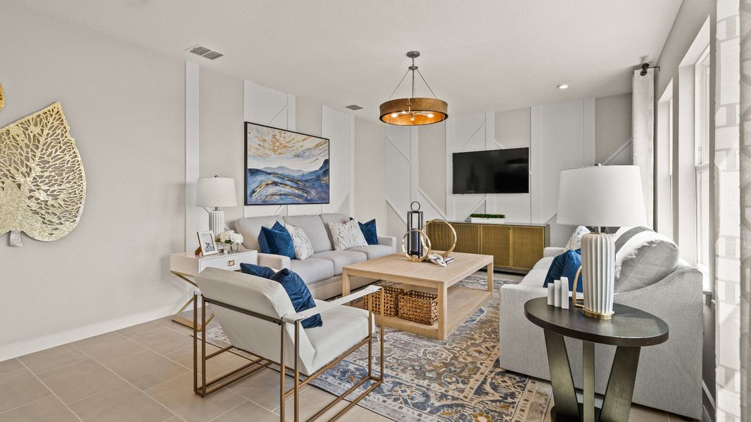 The First Floor Living Area in the Model Highbourne by DRB Homes in Hamilton Bluff located in Haines City, FL. The First Floor Living Area in the Model Highbourne by DRB Homes in Hamilton Bluff located in Haines City, FL.