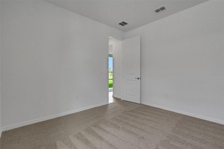Spacious, unfurnished interior of a new home in Turnleaf, Punta Gorda (Image 35). Spacious, unfurnished interior of a new home in Turnleaf, Punta Gorda (Image 35).