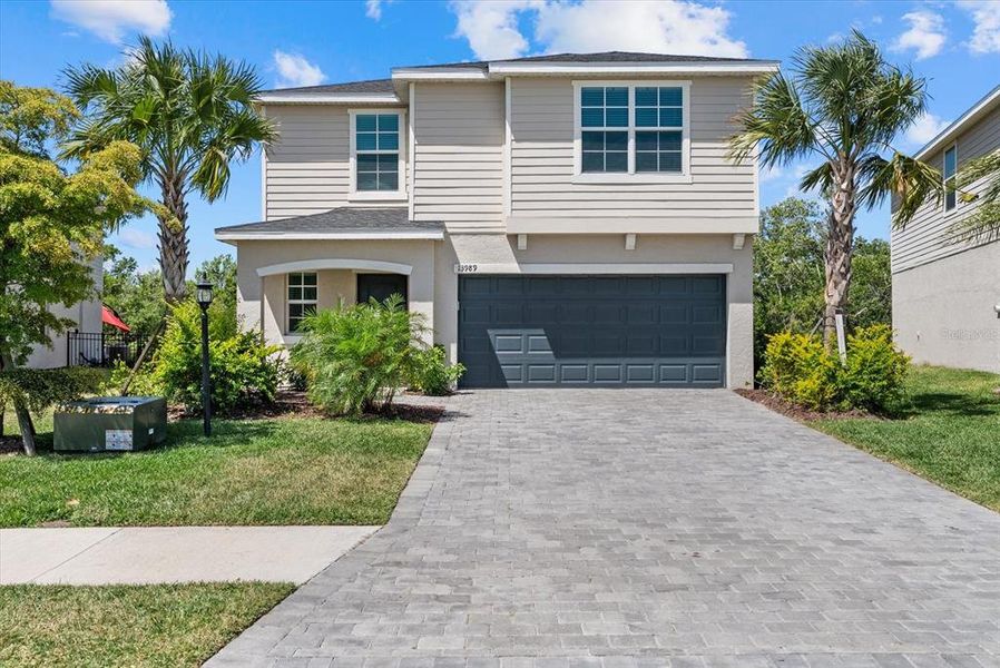 Front exterior of a new home in , Bradenton, FL, highlighting curb appeal (Image 22).