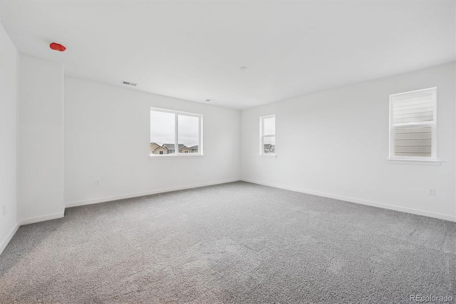 Spacious, unfurnished interior of a new home in Crossway at Second Creek, Commerce City (Image 22).