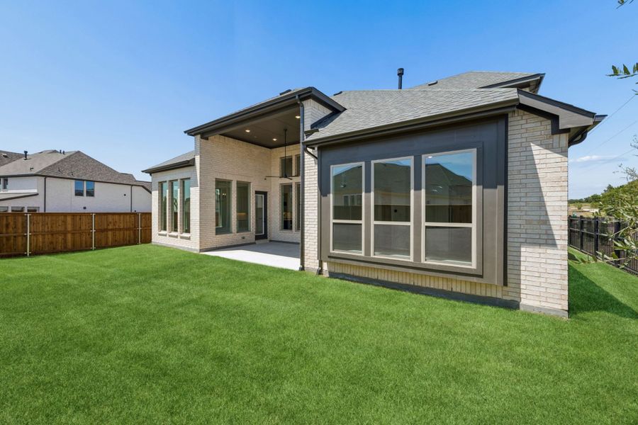 Exterior details and patio area of a home in The Parks at Wilson Creek, Celina (Image 3).