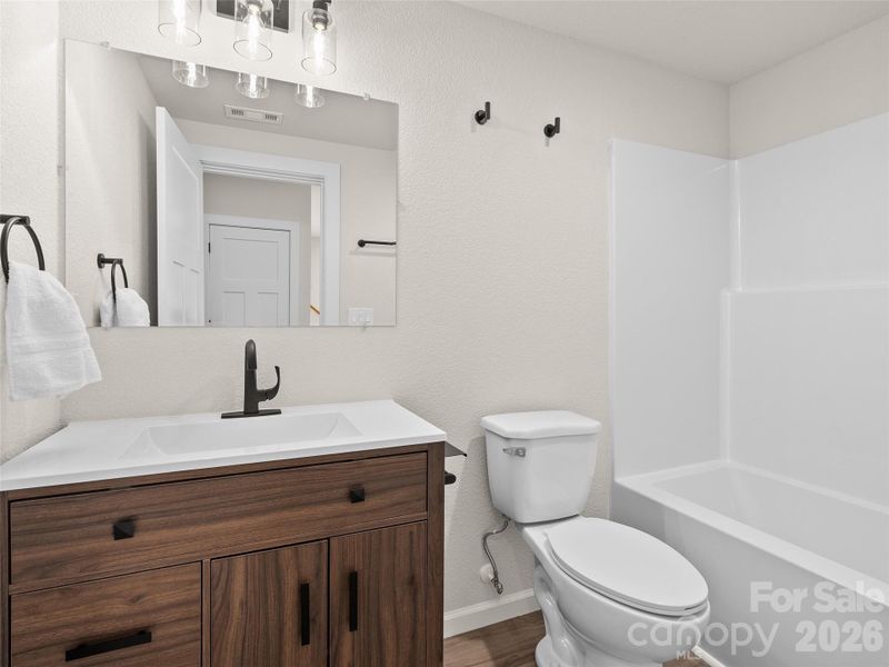 Furnished interior view inside a new home in , Waynesville (Image 11).