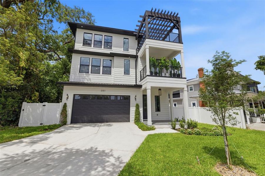 Front exterior of a new home in , Tampa, FL, highlighting curb appeal (Image 26).
