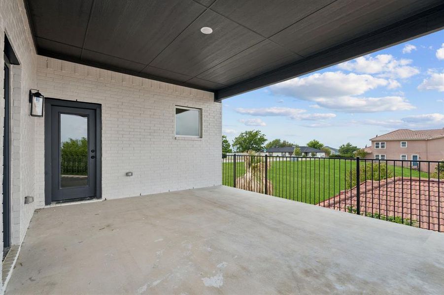 Exterior details and patio area of a home in Hills of Lake Country, Fort Worth (Image 24).