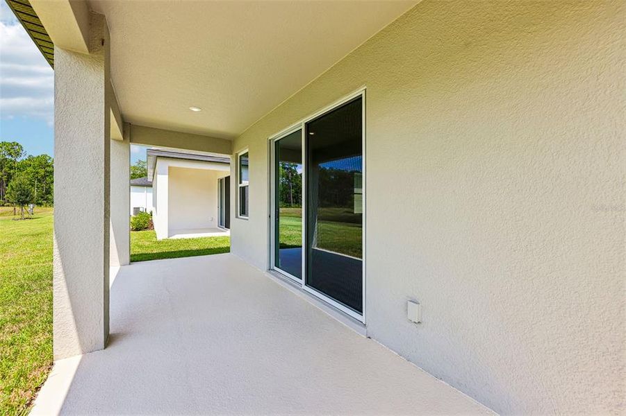 Exterior details and patio area of a home in Ridgehaven - Signature Series, Ormond Beach (Image 27). Exterior details and patio area of a home in Ridgehaven - Signature Series, Ormond Beach (Image 27).