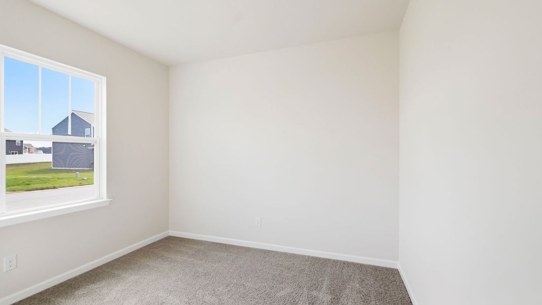 Spacious, unfurnished interior of a new home in Tap Root Farms, Fletcher (Image 14).